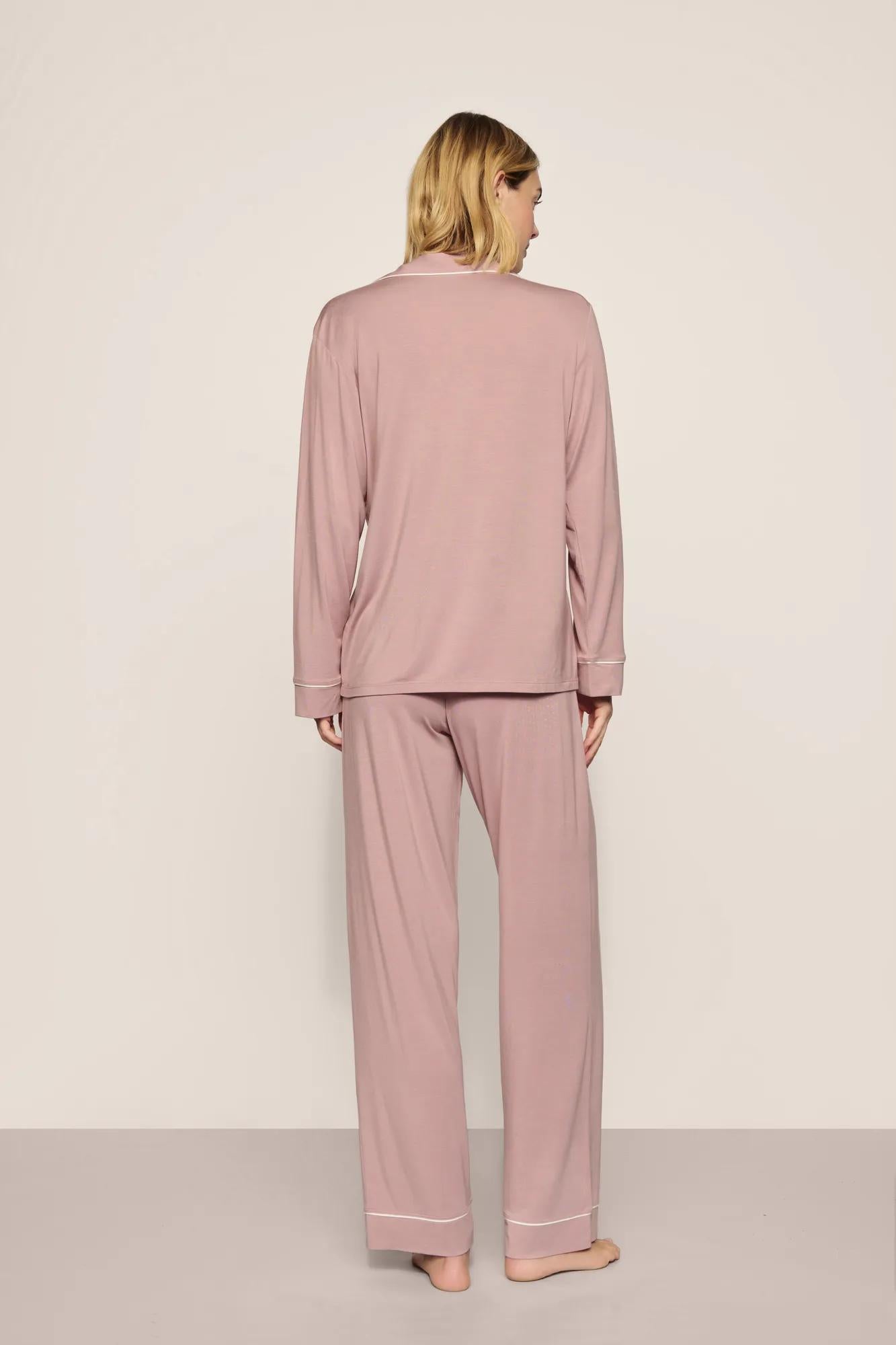 Model is wearing Gisele TENCEL™ Modal Long PJ Set in Woodrose/Ivory