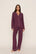 Model is wearing Gisele TENCEL™ Modal Long PJ Set in Wildberry/Ivory