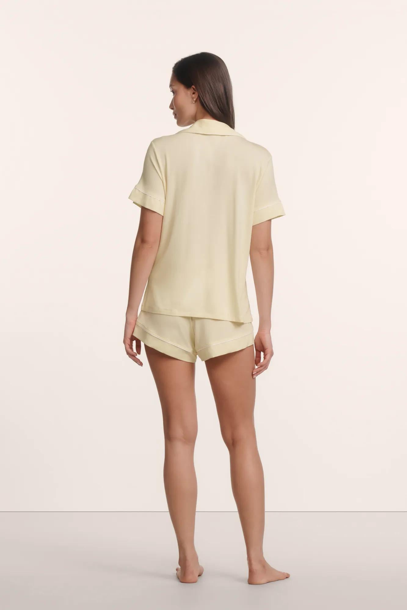 Model is wearing Gisele TENCEL™ Modal Relaxed Short PJ Set in Buttercream/Ivory