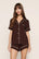 Model is wearing Gisele TENCEL™ Modal Relaxed Short PJ Set in Chocolate/Ivory