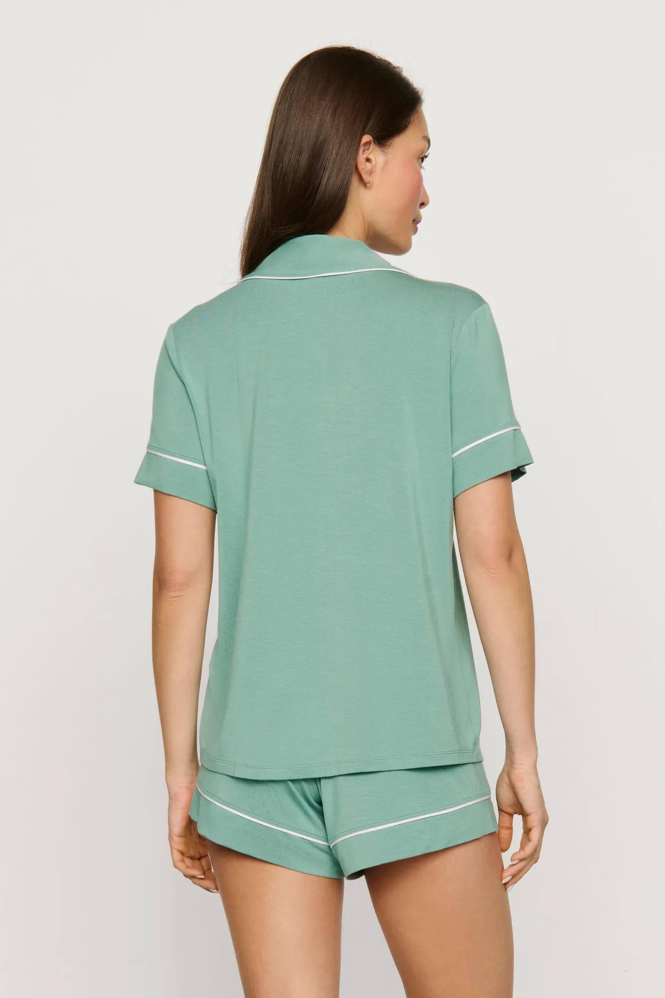 Model is wearing Gisele TENCEL™ Modal Relaxed Short PJ Set in Seagrass/White