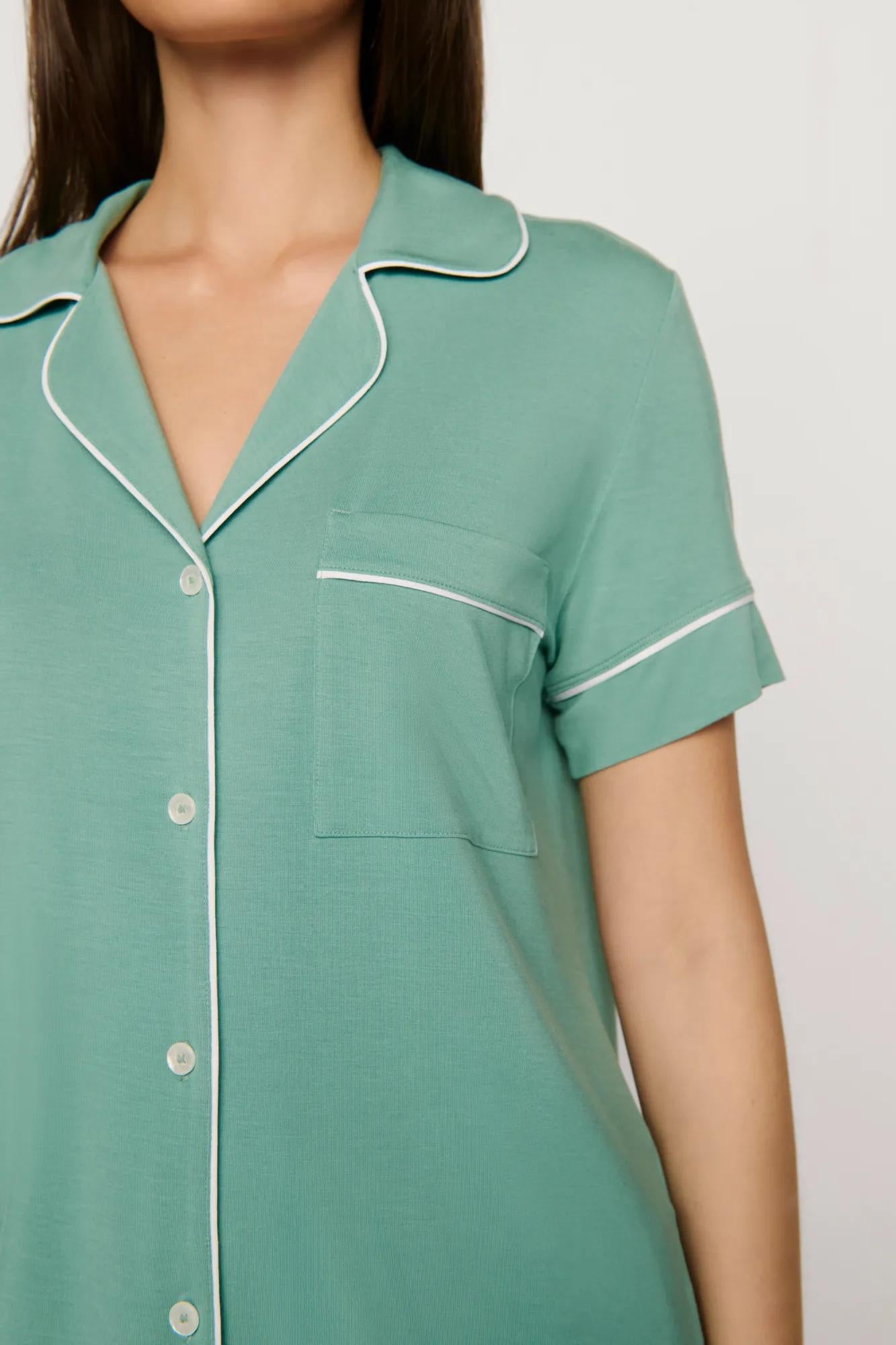 Model is wearing Gisele TENCEL™ Modal Relaxed Short PJ Set in Seagrass/White