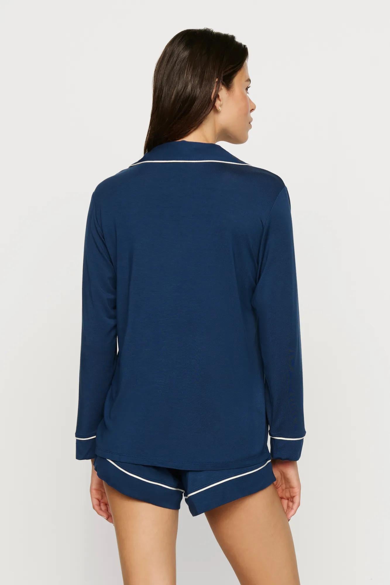 Model is wearing Gisele TENCEL™ Modal Long Sleeve Short PJ Set in Navy/Ivory