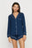 Model is wearing Gisele TENCEL™ Modal Long Sleeve Short PJ Set in Navy/Ivory