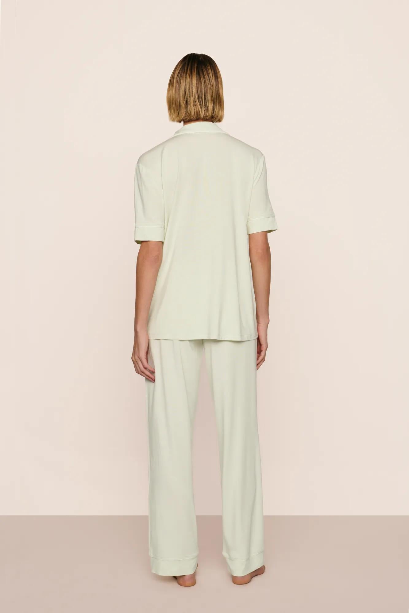 Model is wearing Gisele TENCEL™ Modal Short Sleeve & Pant PJ Set  in Seafoam/Ivory