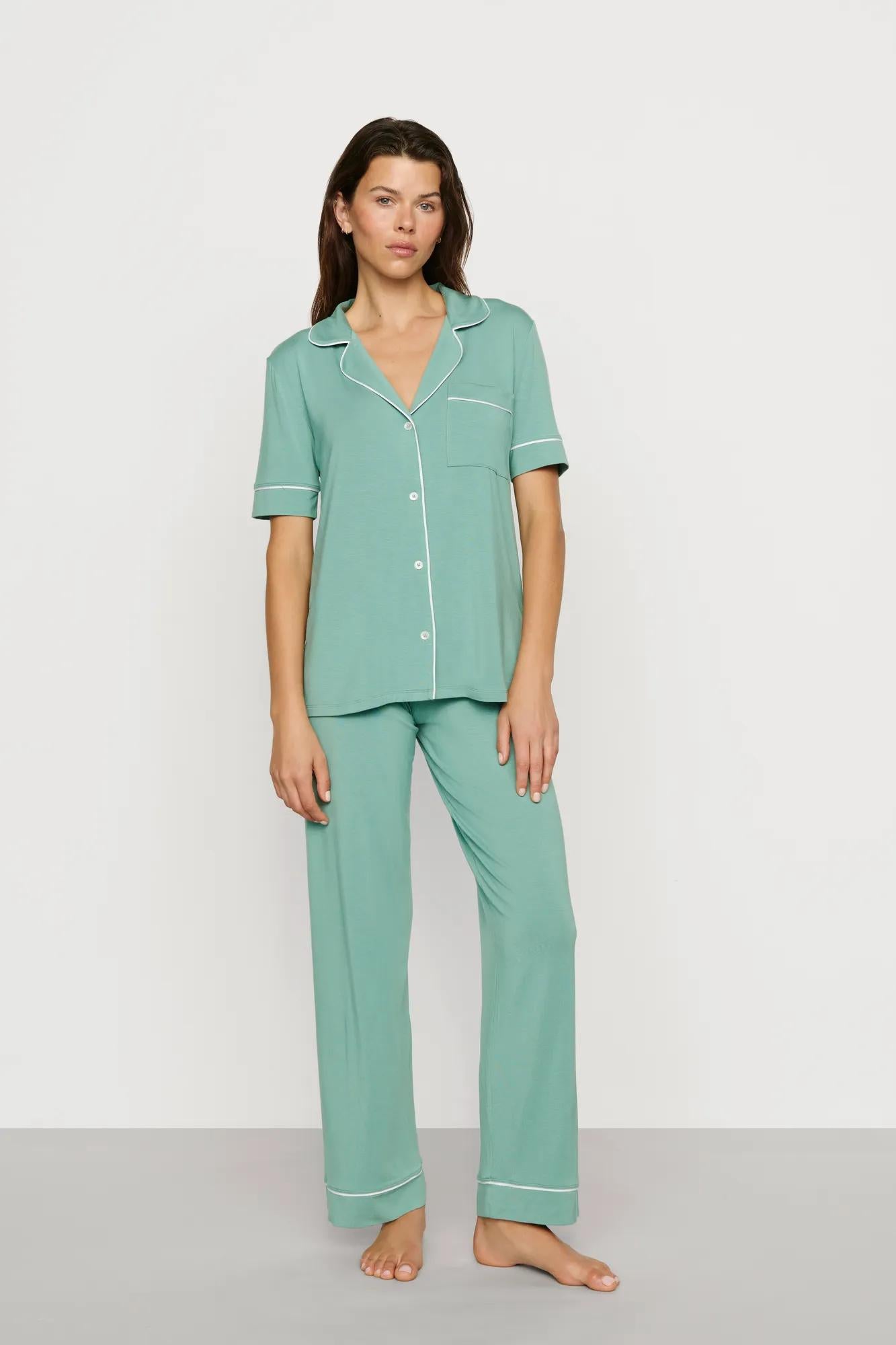 Model is wearing Gisele TENCEL™ Modal Short Sleeve & Pant PJ Set in Seagrass/White