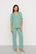 Model is wearing Gisele TENCEL™ Modal Short Sleeve & Pant PJ Set in Seagrass/White