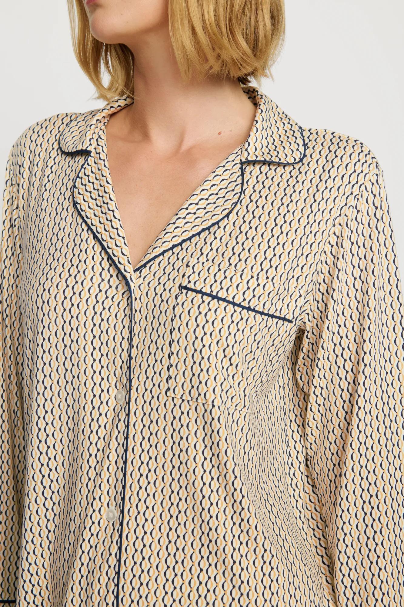 Model is wearing Gisele Printed TENCEL™ Modal Long PJ Set in Hourglass Sunbeam/Navy
