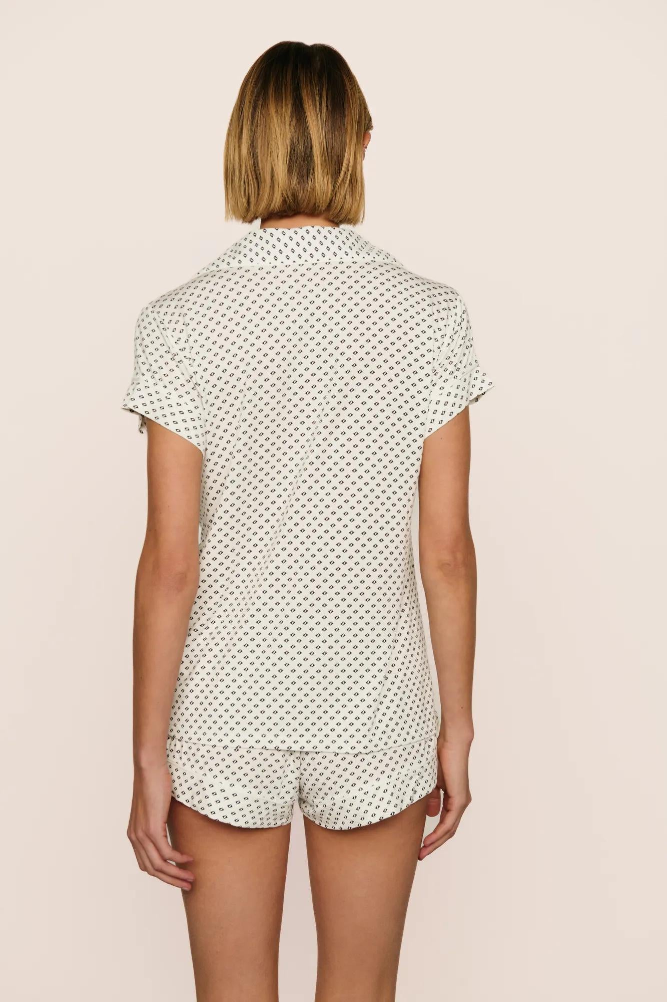 Model is wearing Gisele Printed TENCEL™ Modal Shortie Short PJ Set in Tide Dot Ivory/Ivory