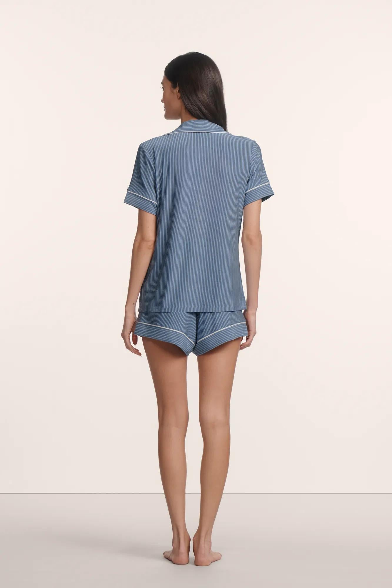 Model is wearing Gisele Printed TENCEL™ Modal Relaxed Short PJ Set in Duo Stripe Slate Blue/Ivory