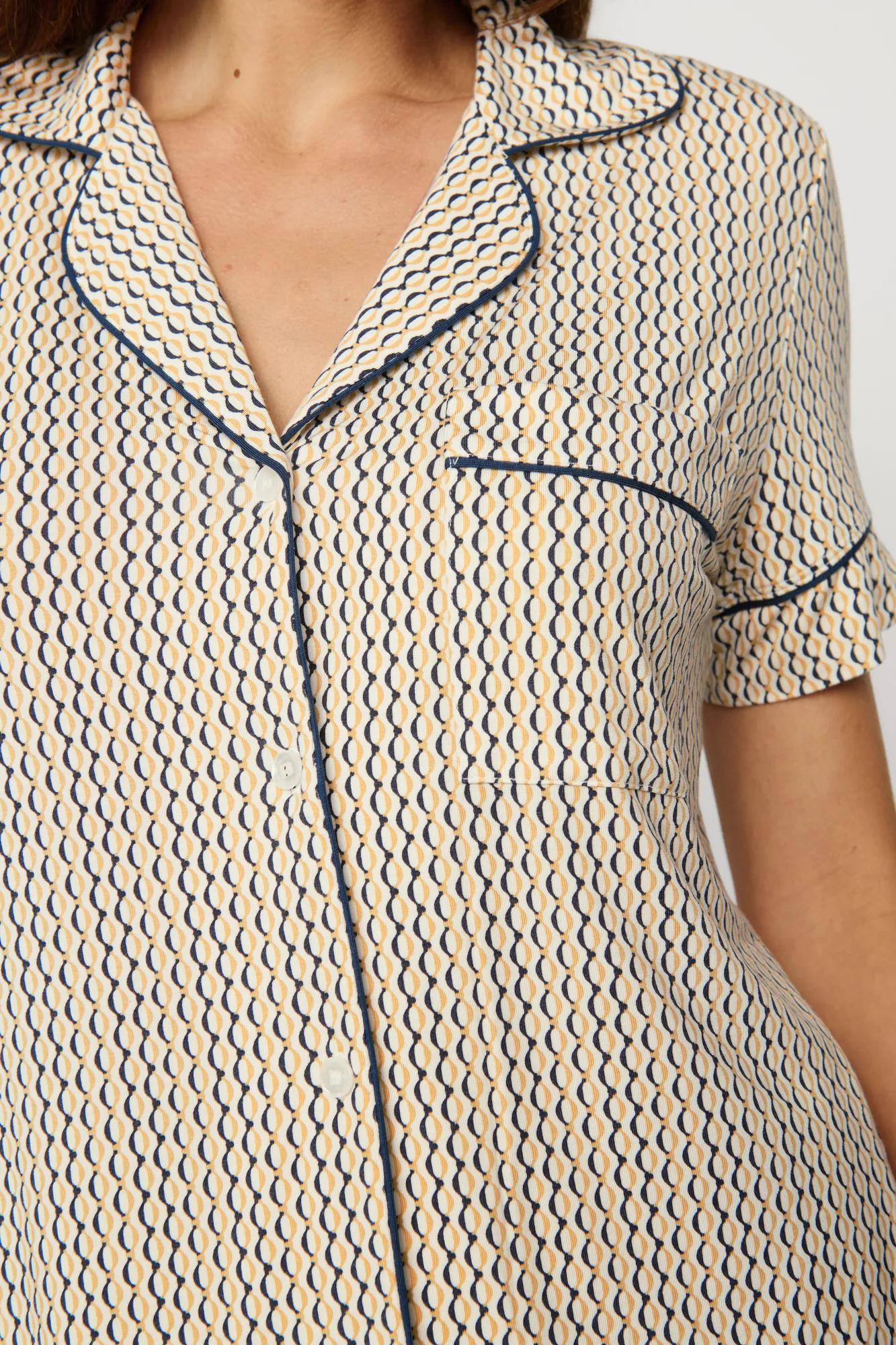 Model is wearing Gisele Printed TENCEL™ Modal Relaxed Short PJ Set in Hourglass Sunbeam/Navy