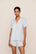 Model is wearing Gisele Printed TENCEL™ Modal Relaxed Short PJ Set in Large Swans Ice Blue/Ivory