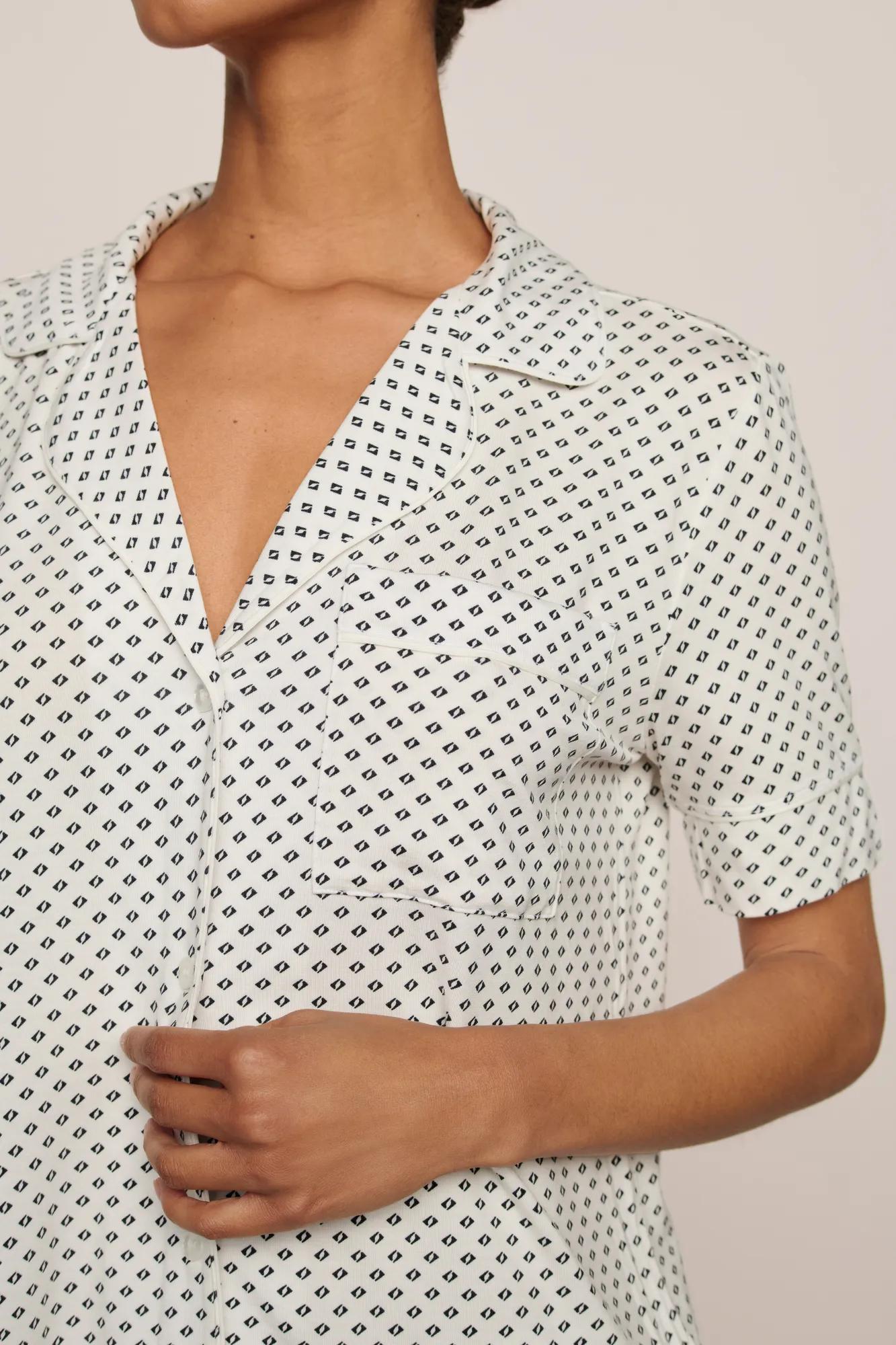 Model is wearing Gisele Printed TENCEL™ Modal Short Sleeve Pant PJ Set in Tide Dot Ivory/Ivory