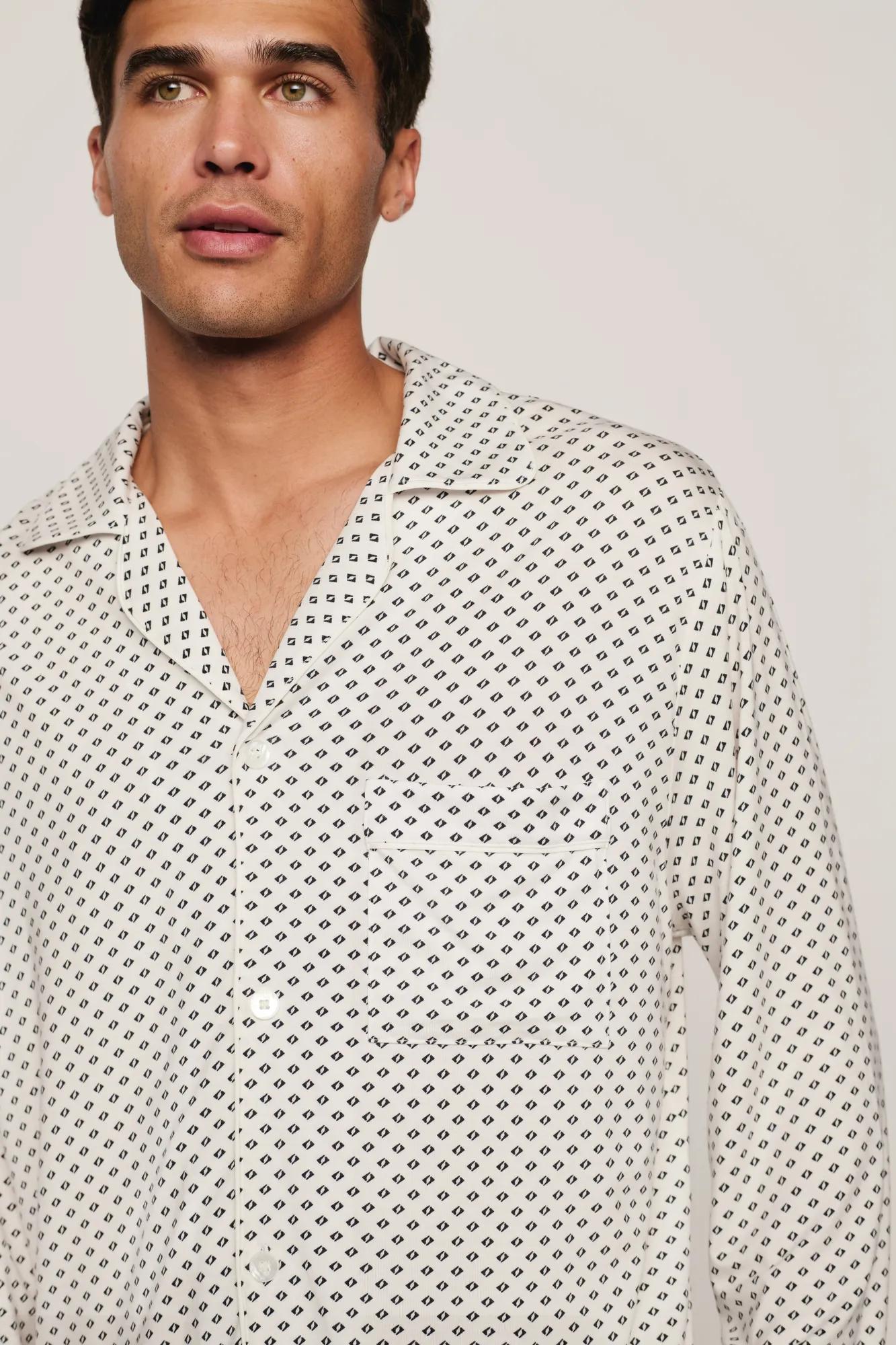 Model is wearing William Printed TENCEL™ Modal Long PJ Set in Tide Dot Ivory/Ivory