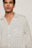 Model is wearing William Printed TENCEL™ Modal Long PJ Set in Tide Dot Ivory/Ivory