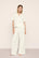 Model is wearing Pima Cotton Short Sleeve & Pant PJ Set  in  Ivory