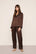 Model is wearing Inez Washable Silk Long PJ Set in Chocolate/Ivory