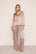 Model is wearing Inez Washable Silk Printed Long PJ Set in Animal Instinct Woodrose/Woodr