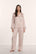 Model is wearing Inez Washable Silk Printed Long PJ Set in Brushstroke Misty Rose/Misty Rose