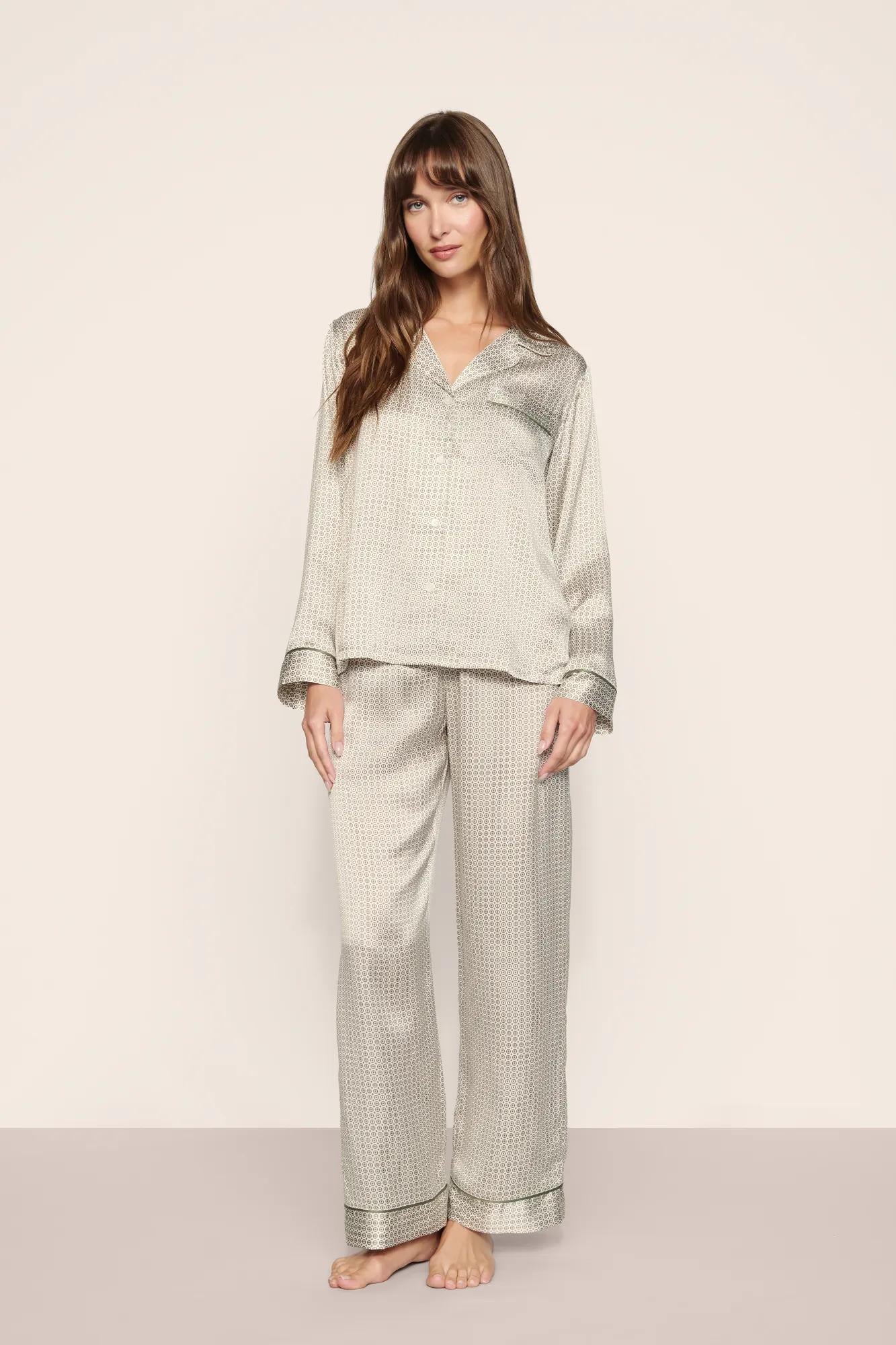 Model is wearing Inez Washable Silk Printed Long PJ Set  in  Geo Mod Desert Sage/Desert Sag