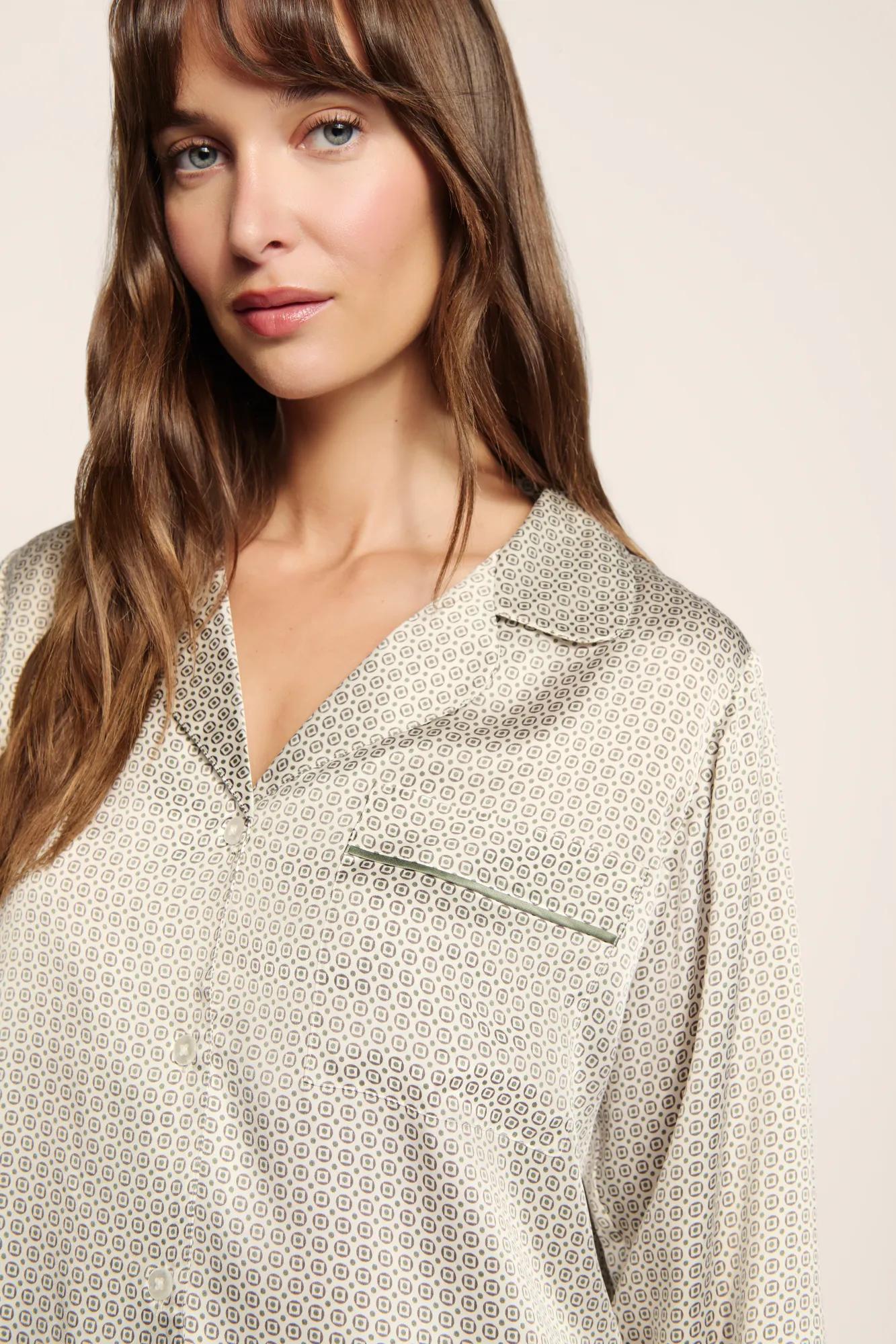 Model is wearing Inez Washable Silk Printed Long PJ Set  in  Geo Mod Desert Sage/Desert Sag