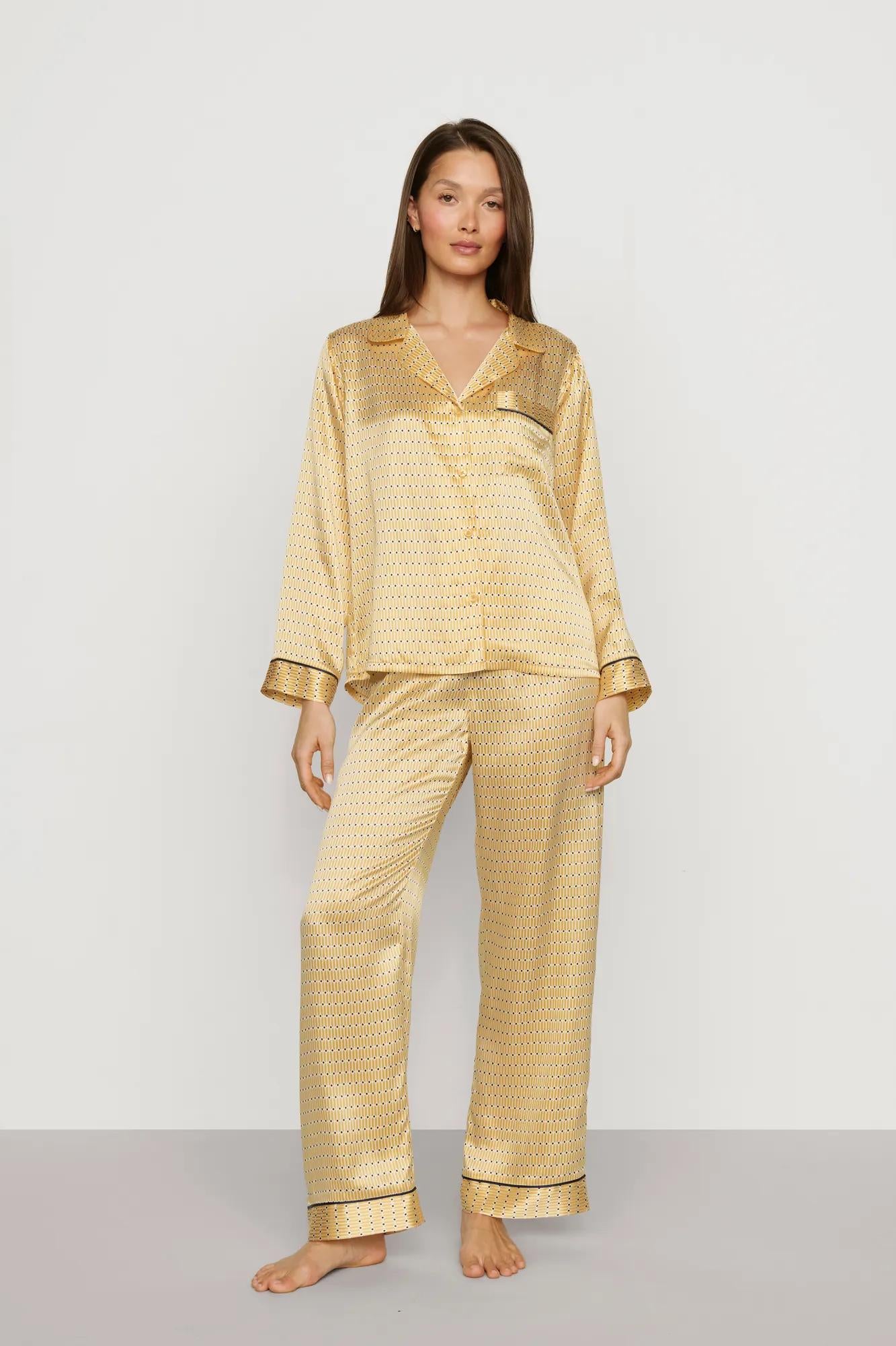 Model is wearing Inez Washable Silk Printed Long PJ Set in Stained Glass Sunbeam/Navy