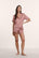 Model is wearing Inez Washable Silk Printed Short PJ Set in Brushstroke Misty Rose/Misty Rose
