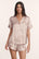 Model is wearing Inez Washable Silk Printed Short PJ Set in Brushstroke Misty Rose/Misty Rose