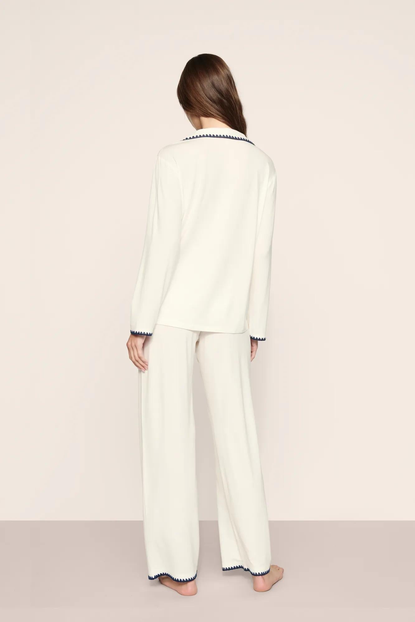 Model is wearing Frida TENCEL™ Modal Long PJ Set  in  Ivory/Navy