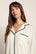 Model is wearing Frida TENCEL™ Modal Long PJ Set  in  Ivory/Navy