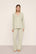 Model is wearing Frida TENCEL™ Modal Long PJ Set  in  Sandstone/Ivory
