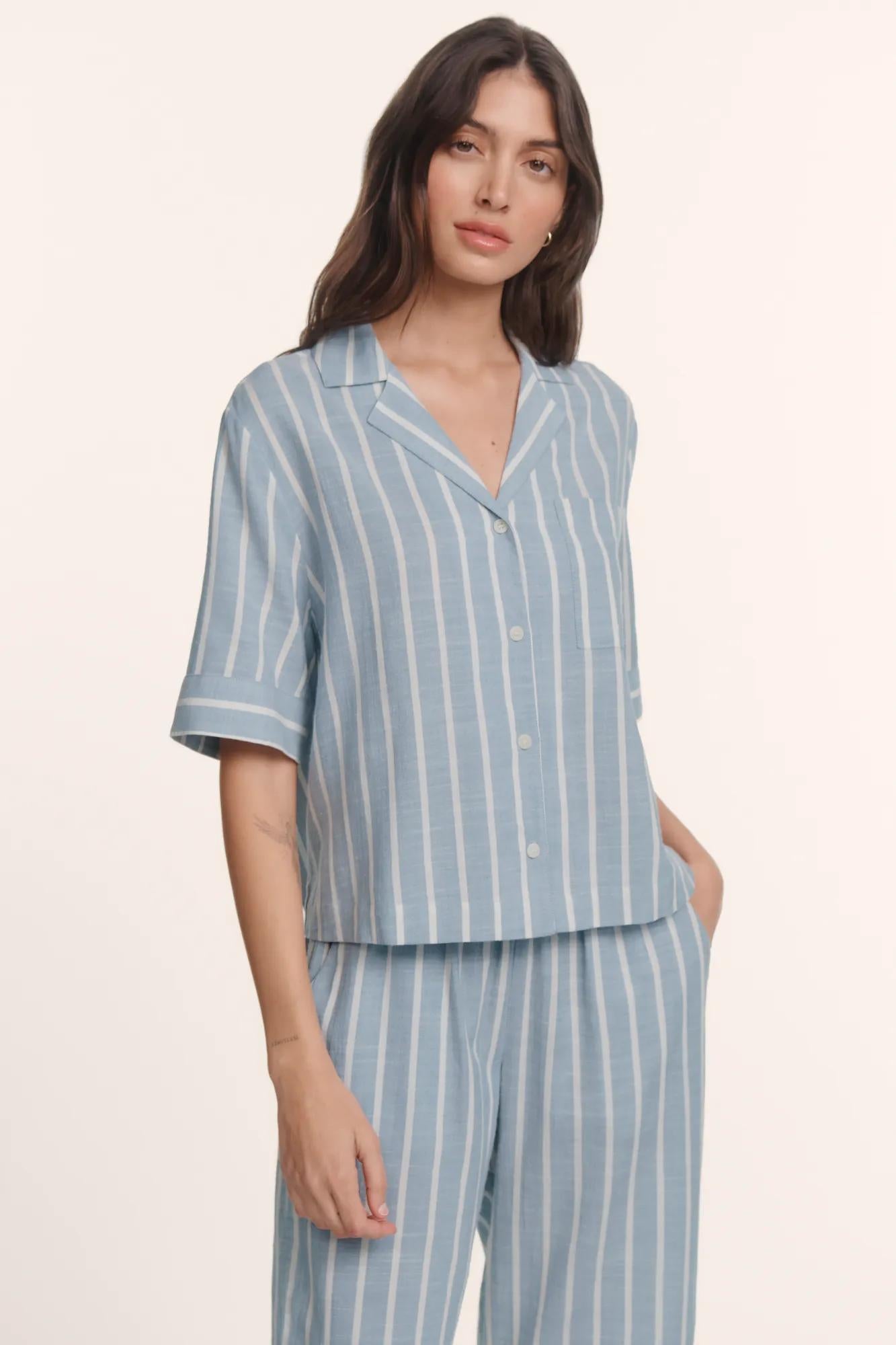 Model is wearing Nautico Relaxed Short Sleeve & Pant PJ Set in Classic Stripe Slate Blue/Ivor