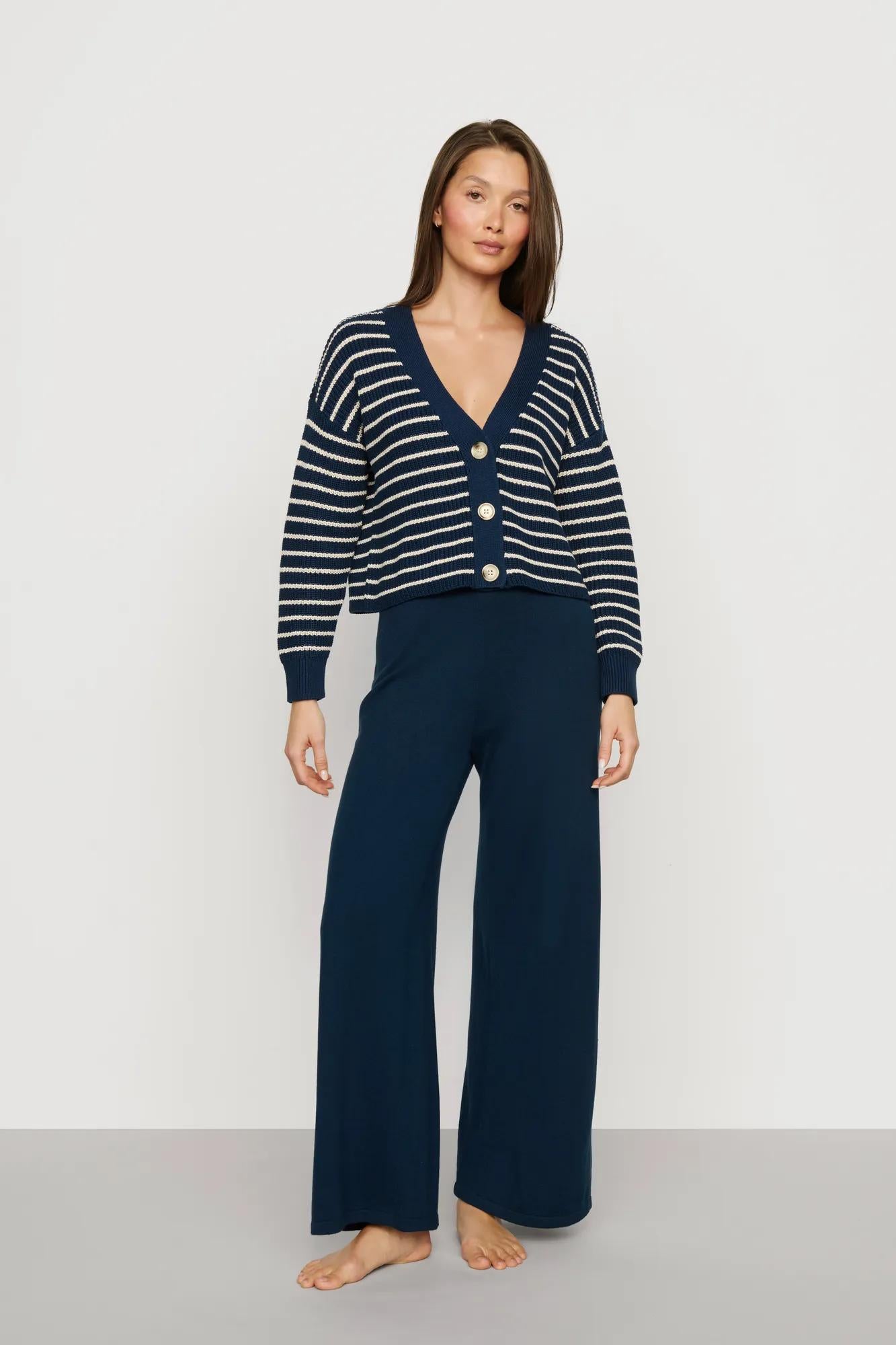 Model is wearing Fine Gauge Sweater Pant in Navy