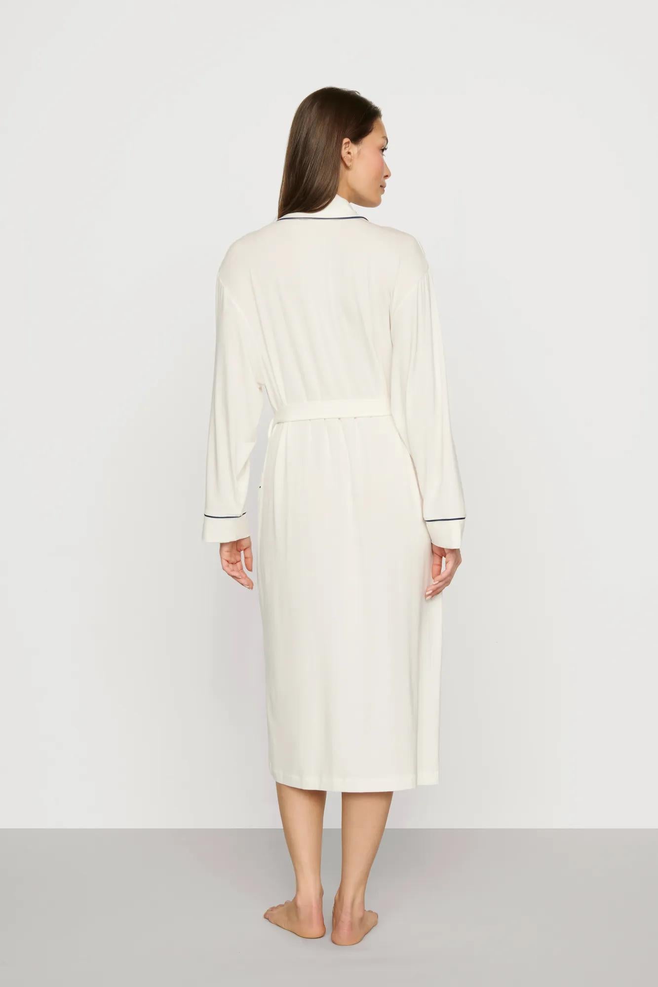 Model is wearing Gisele TENCEL™ Modal Long Robe in Ivory/Navy