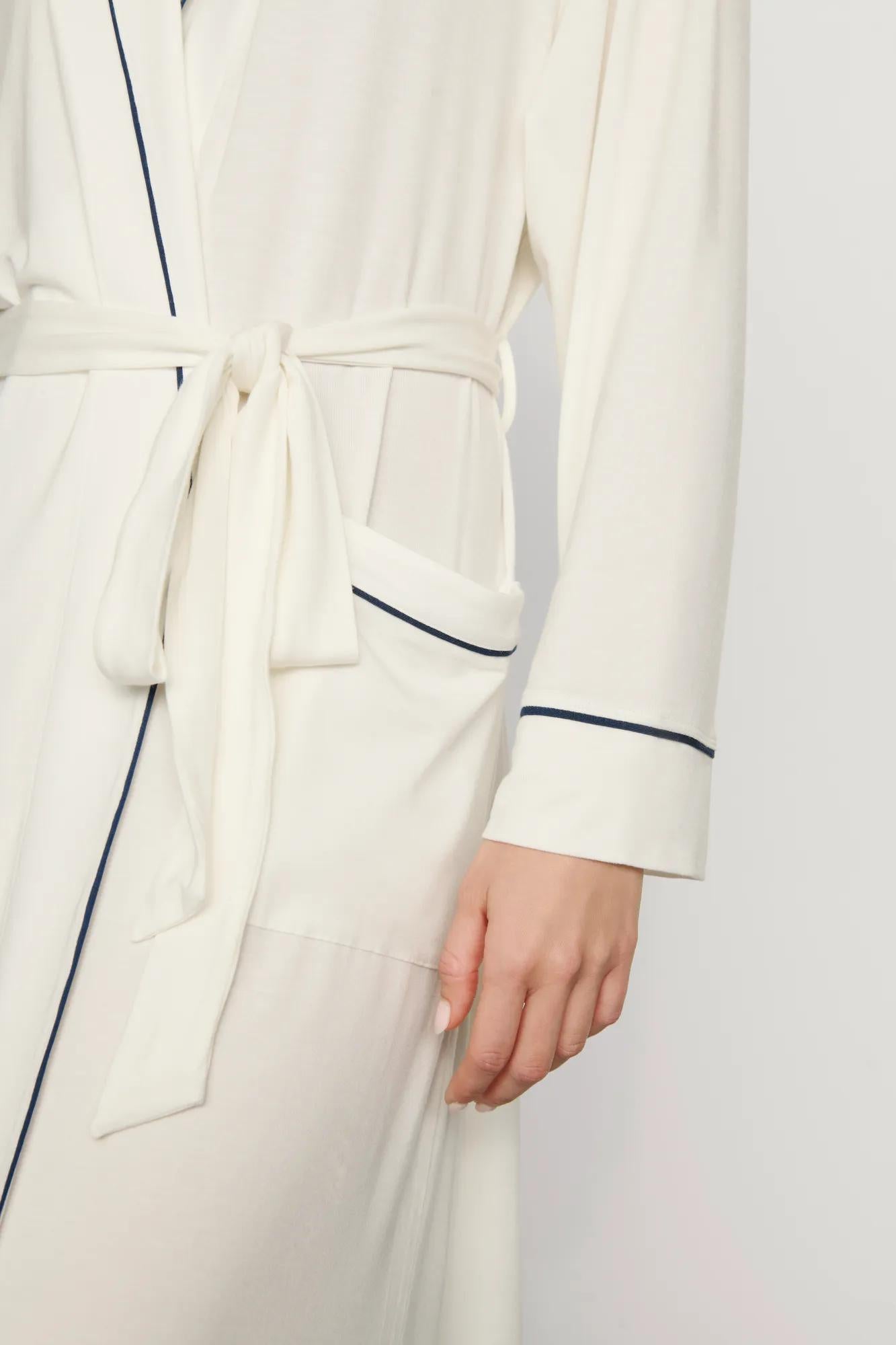 Model is wearing Gisele TENCEL™ Modal Long Robe in Ivory/Navy