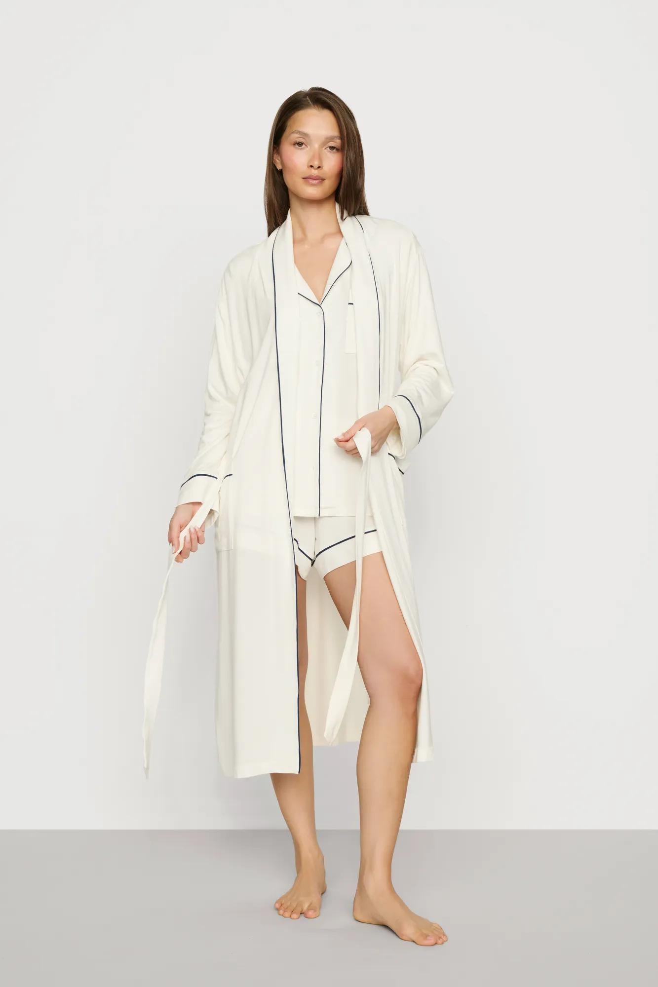 Model is wearing Gisele TENCEL™ Modal Long Robe in Ivory/Navy
