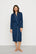 Model is wearing Gisele TENCEL™ Modal Long Robe in Navy/Ivory