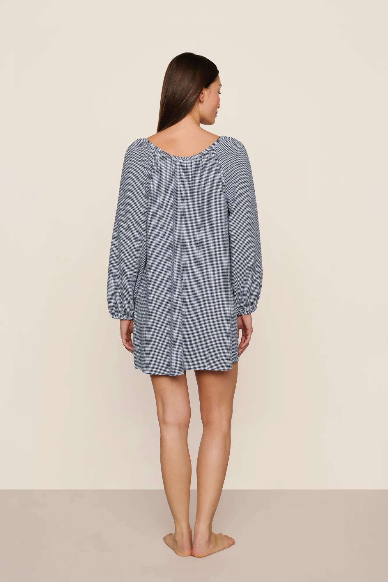 Model is wearing Linen Blend Short Dress in Gingham White/Navy