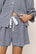 Model is wearing Linen Blend Relaxed Short in GinghamWhite/Navy