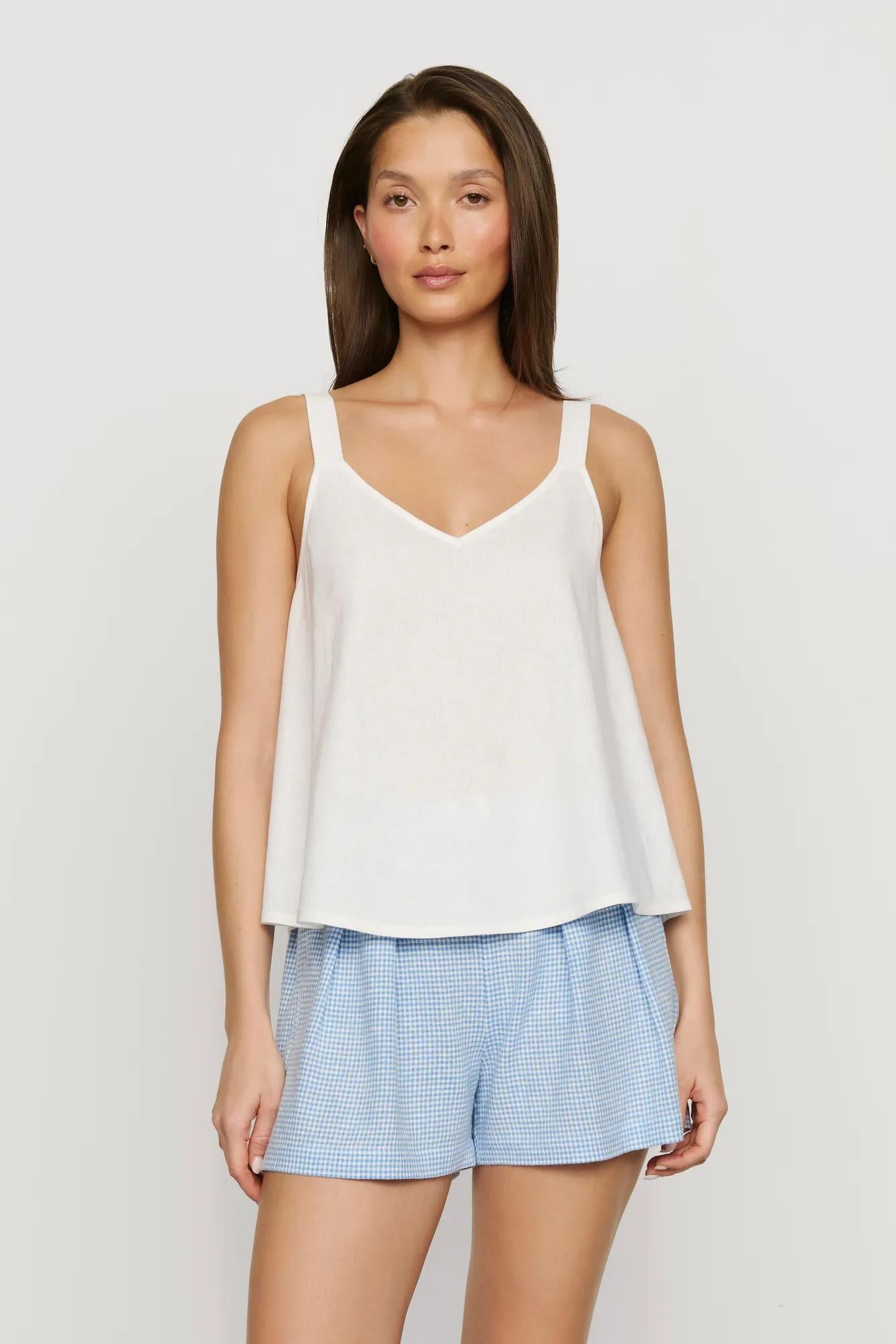 Model is wearing Linen Blend Relaxed Short in Gingham White/Summer Blue