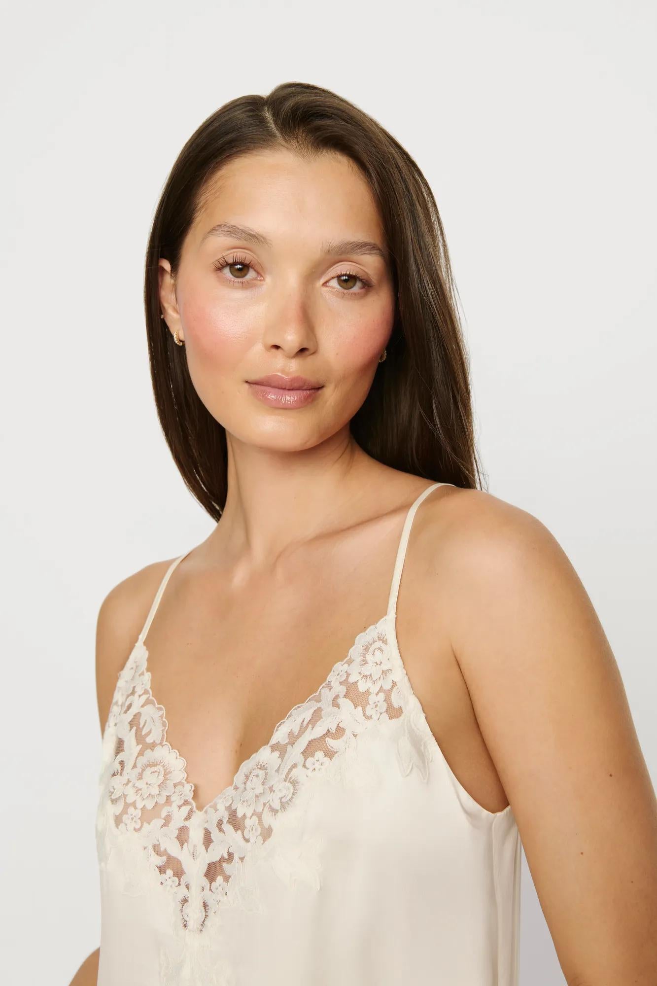 Model is wearing Washable Silk with Lace Embroidery Short Slip in Ivory