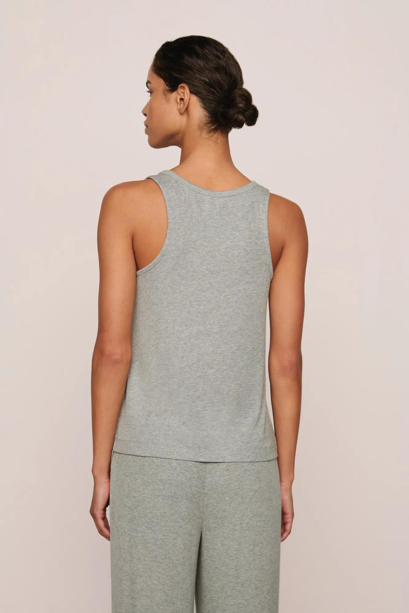Model is wearing Dream Rib V Neck Tank in Dark Heather Grey