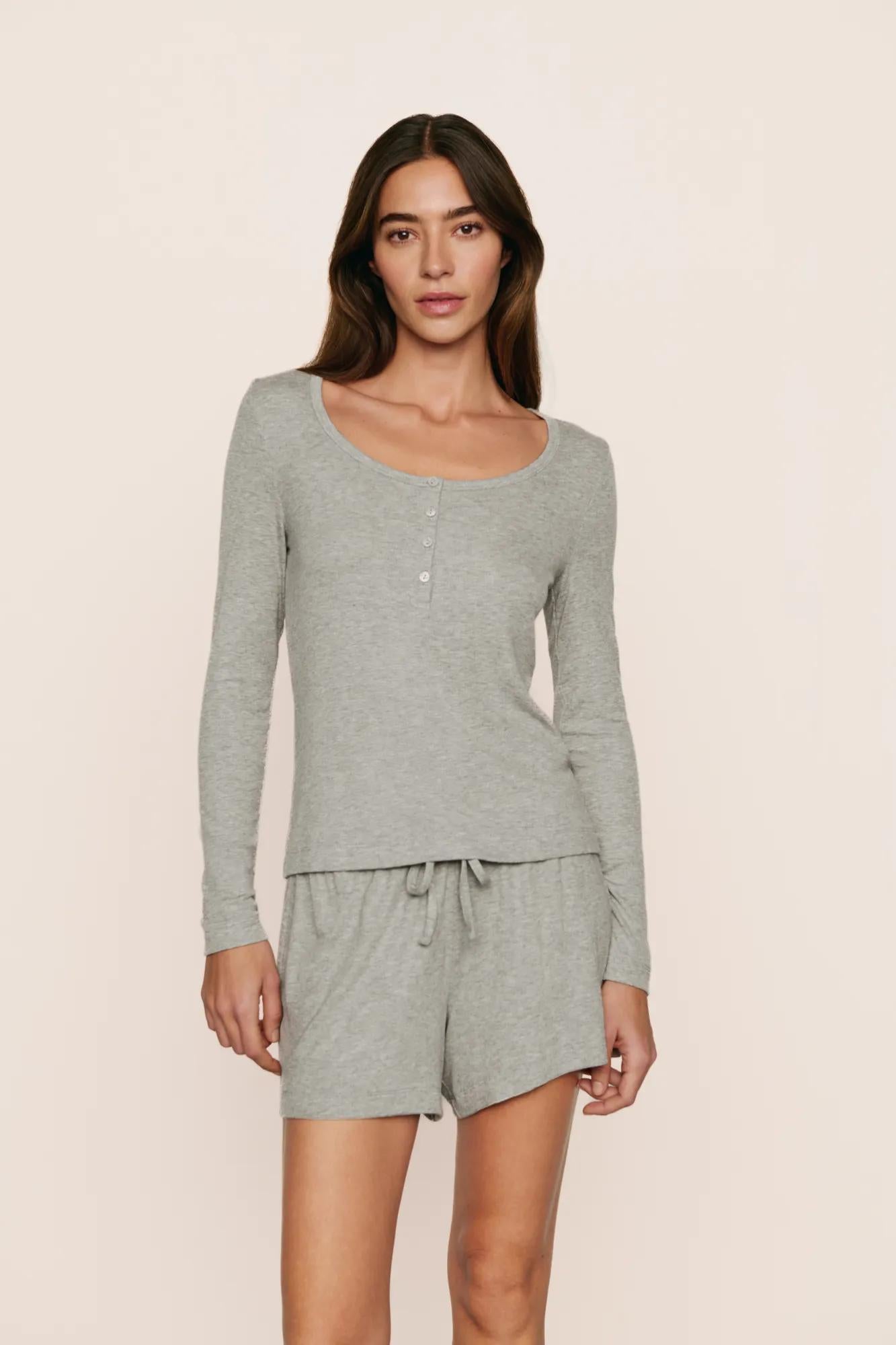 Model is wearing Dream Rib Long Sleeve Henley Tee in Dark Heather Grey