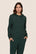 Model is wearing Recycled Boucle Hoodie  in Pine