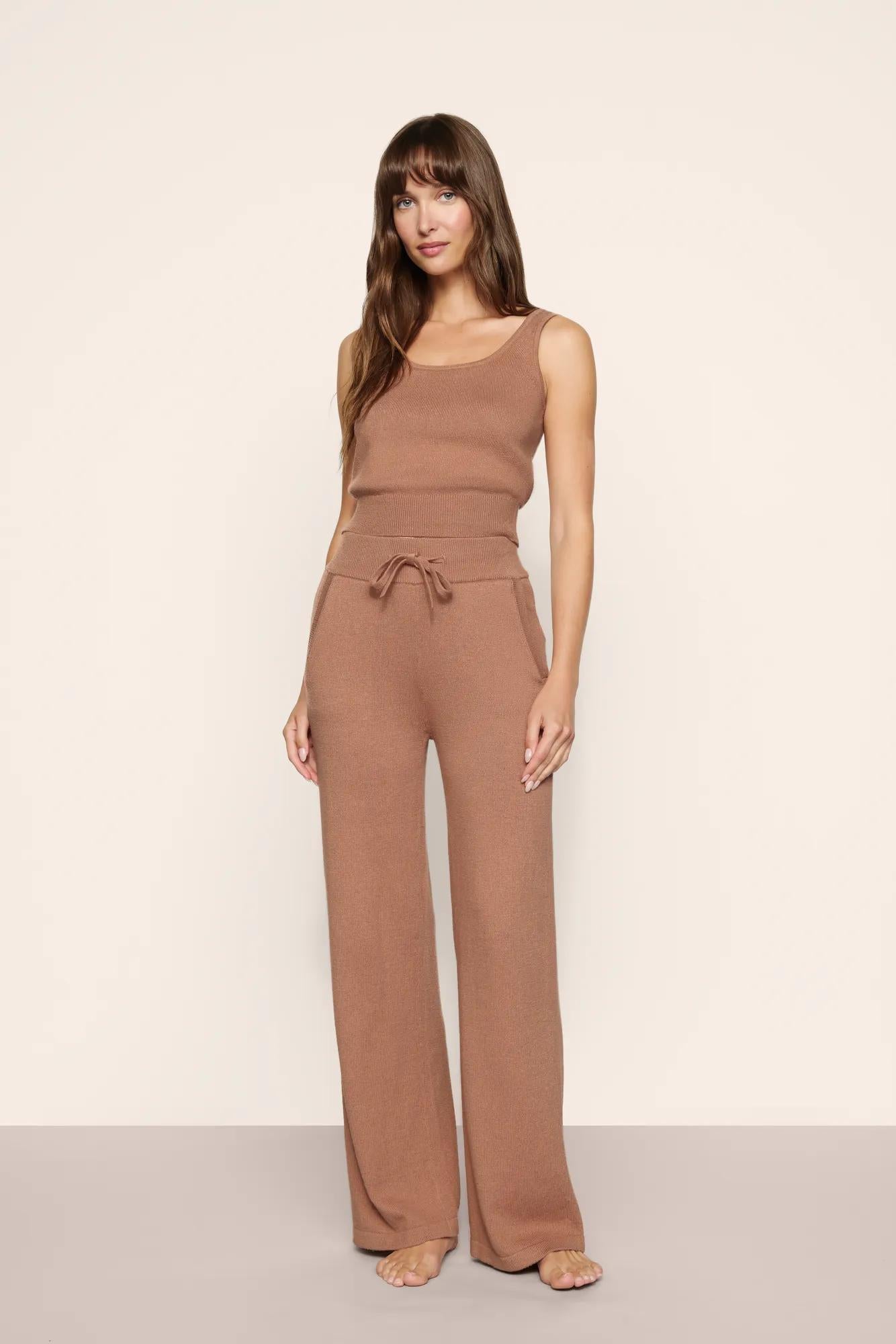 Model is wearing Recycled Sweater Pant  in  Hazelnut