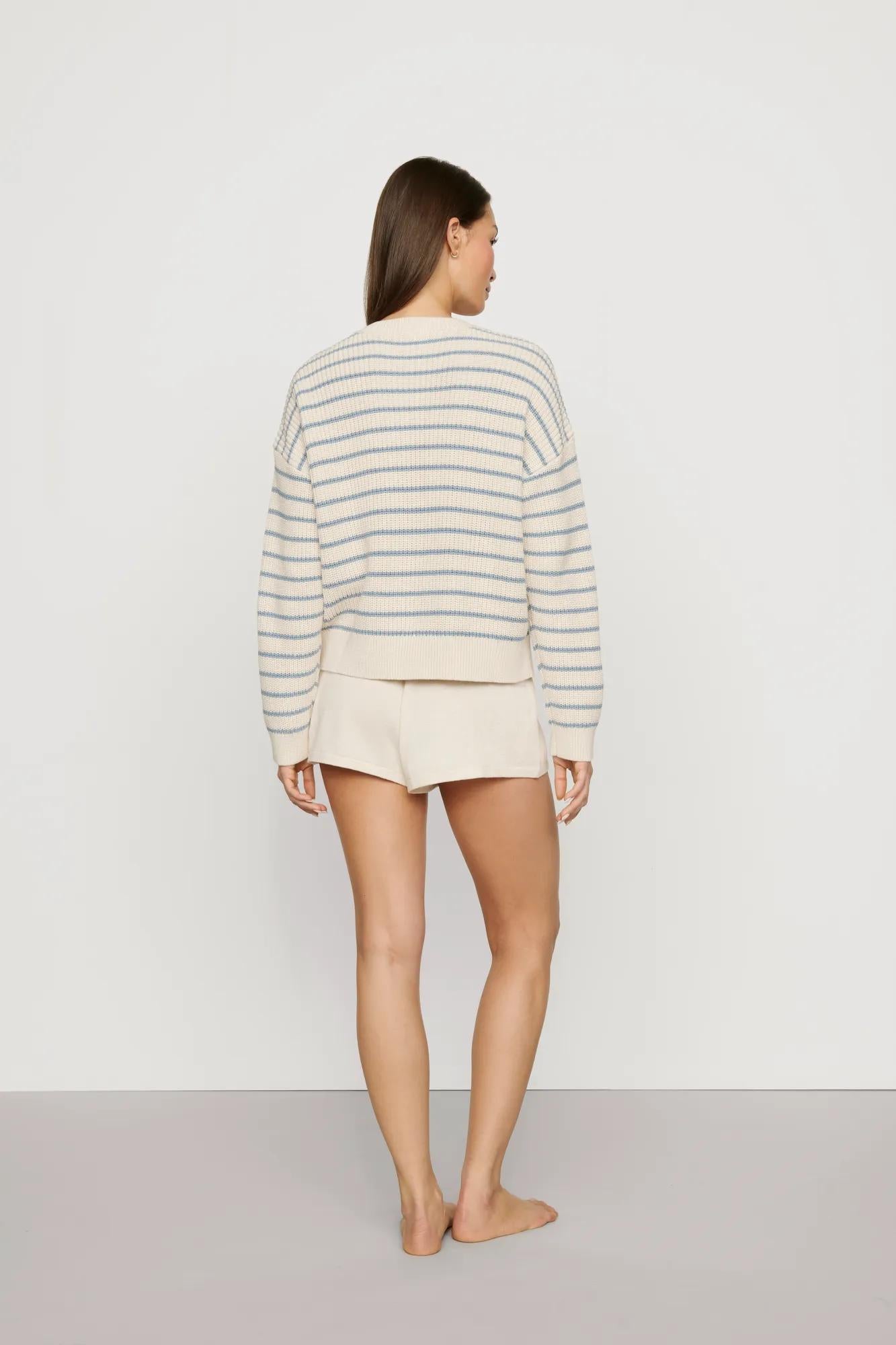 Model is wearing Coastal Cotton Sweater Polo in Regatta Stripe Summer Blue/Whi