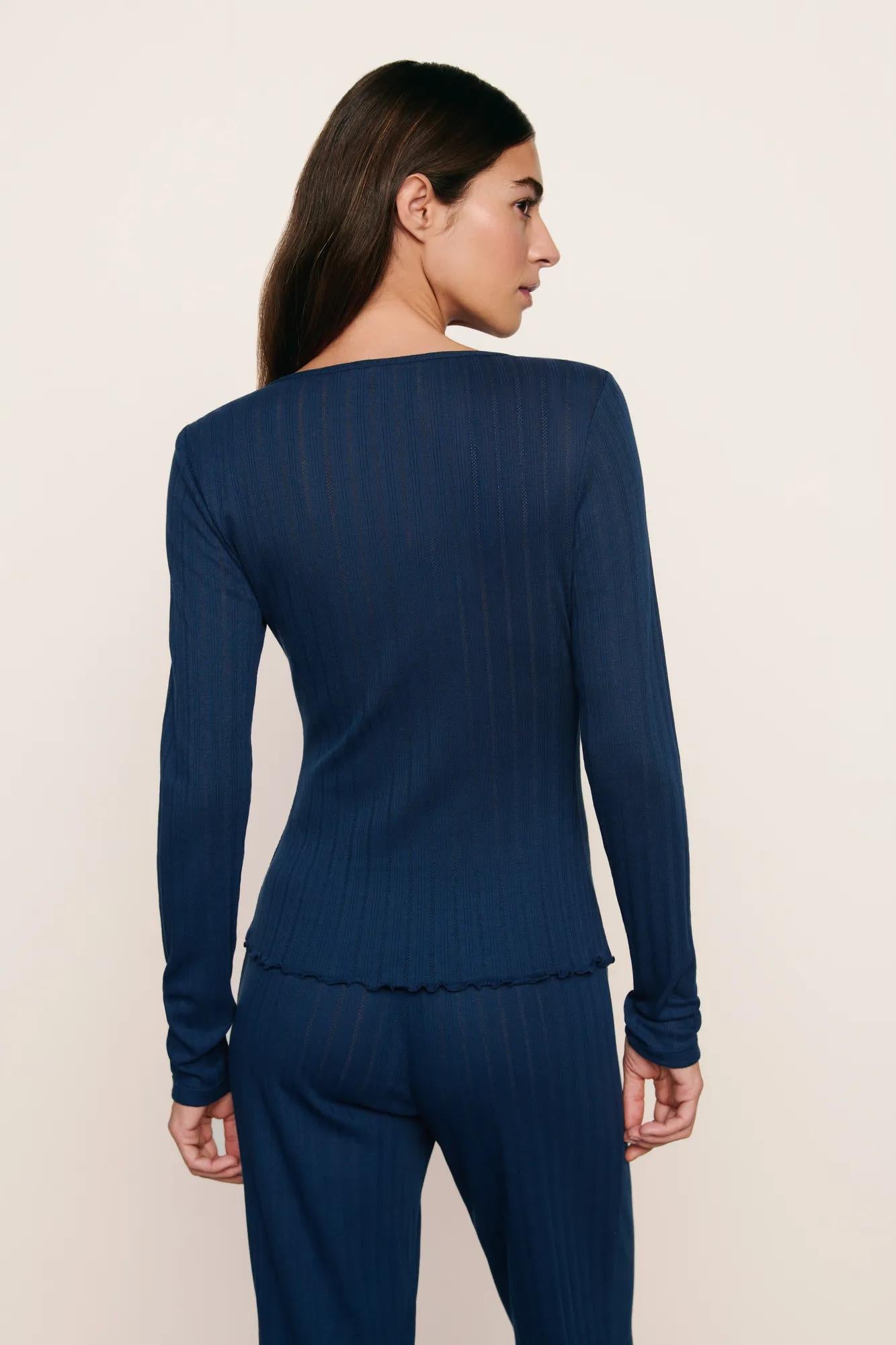 Model is wearing Pointelle V Neck Henley  in Navy