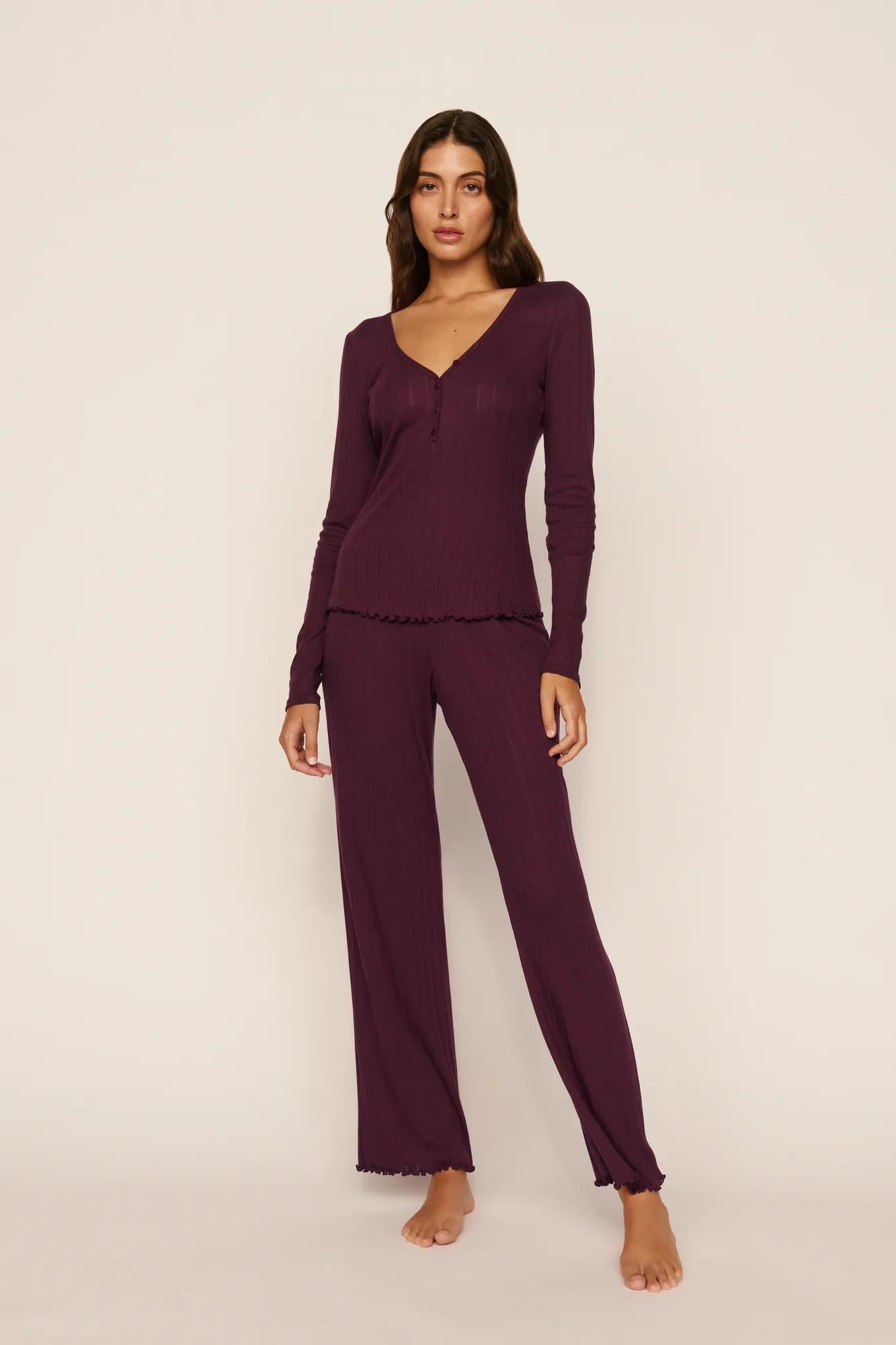 Model is wearing Pointelle V Neck Henley in Wildberry