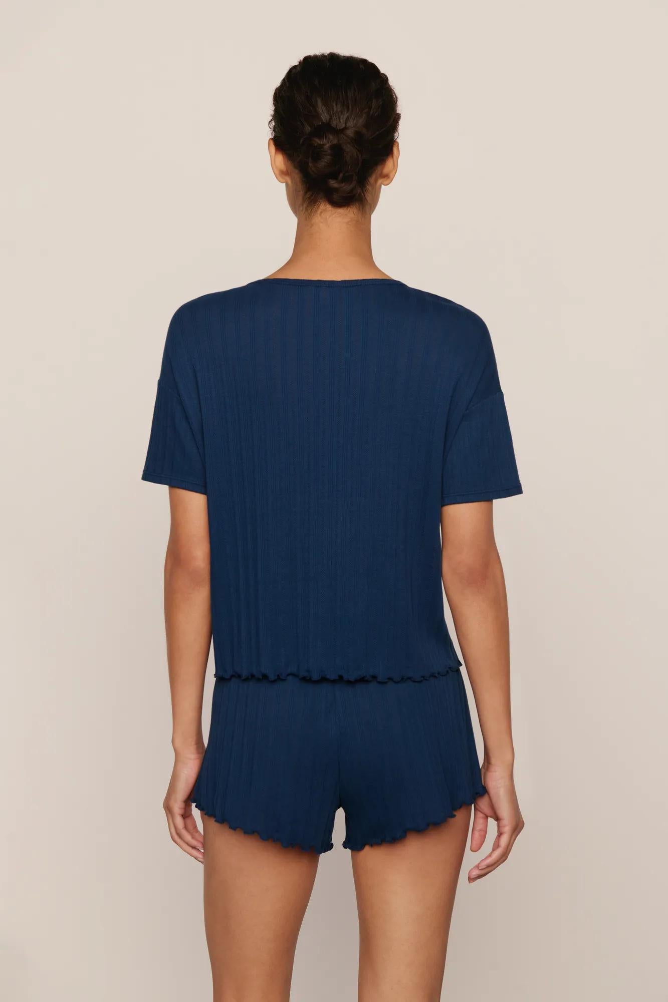 Model is wearing Pointelle Short Sleeve Tee  in Navy