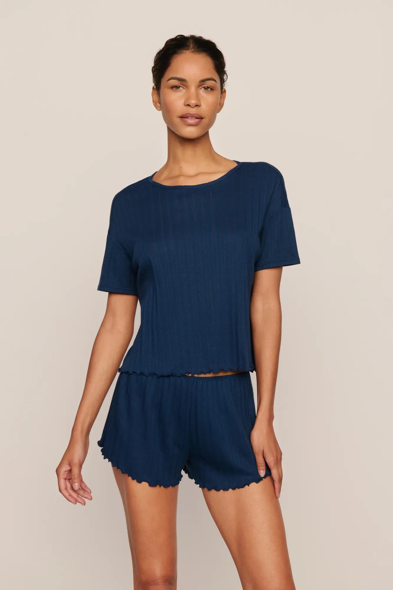 Model is wearing Pointelle Short Sleeve Tee  in Navy